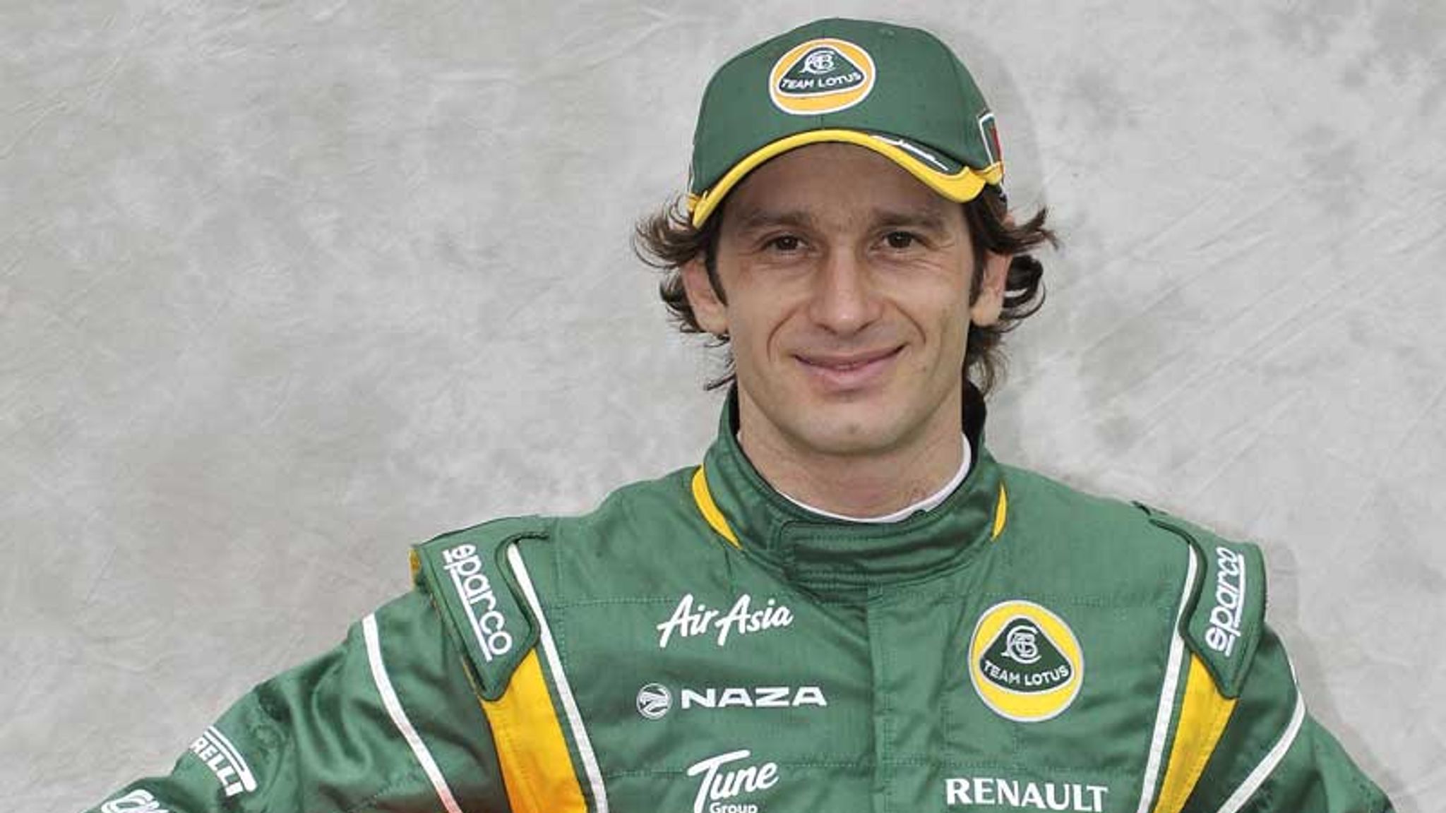 Jarno Trulli dalam sut perlumbaan Team Lotus